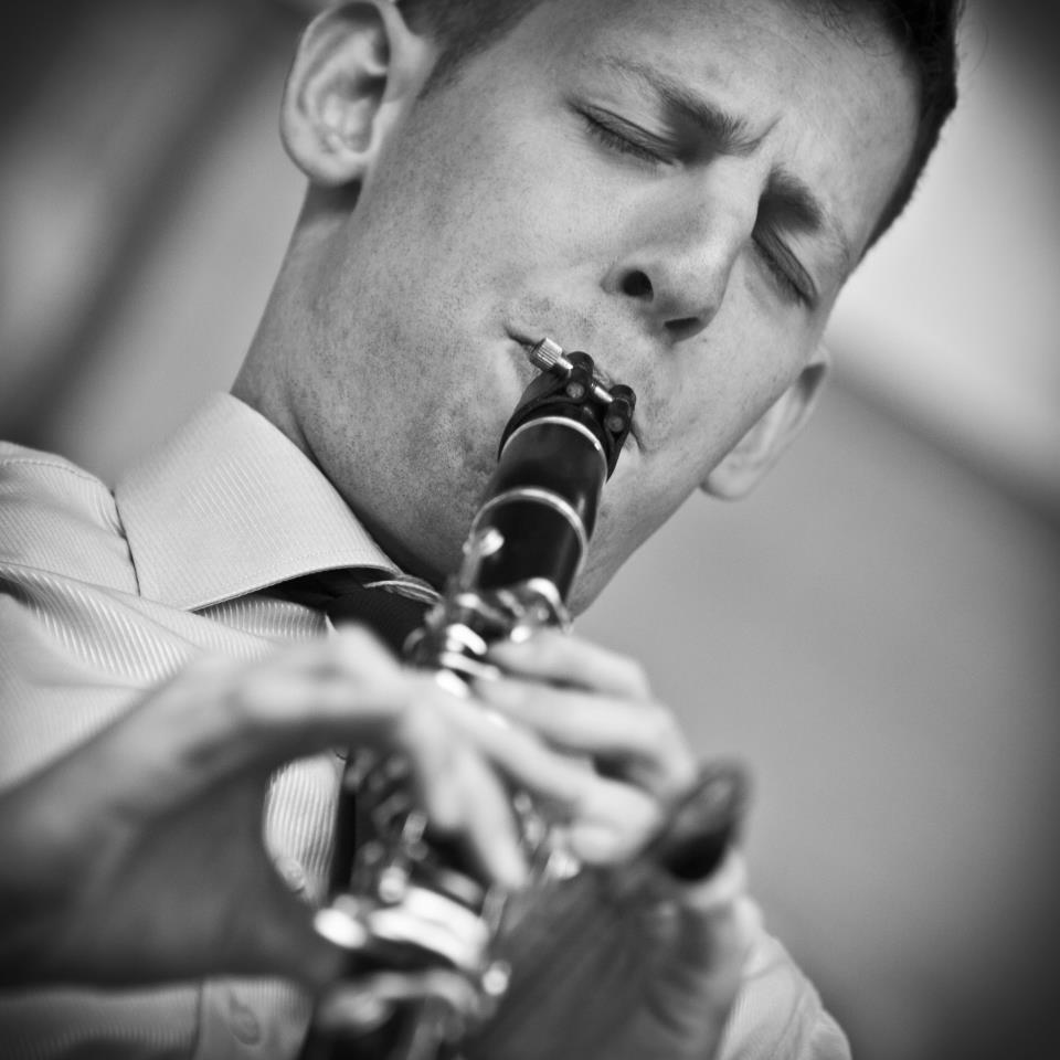 Gal Klein playing clarinet, eyes closed